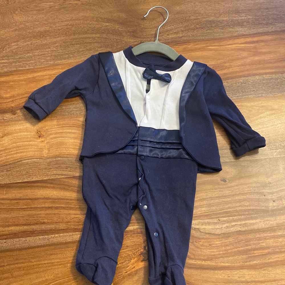 Baby Tux Onesie complete with attached bow tie and coattails. Worn once